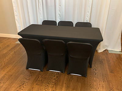 Rent black folding chair covers.