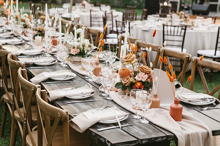 Rent rustic wood cross back chairs for wedding.