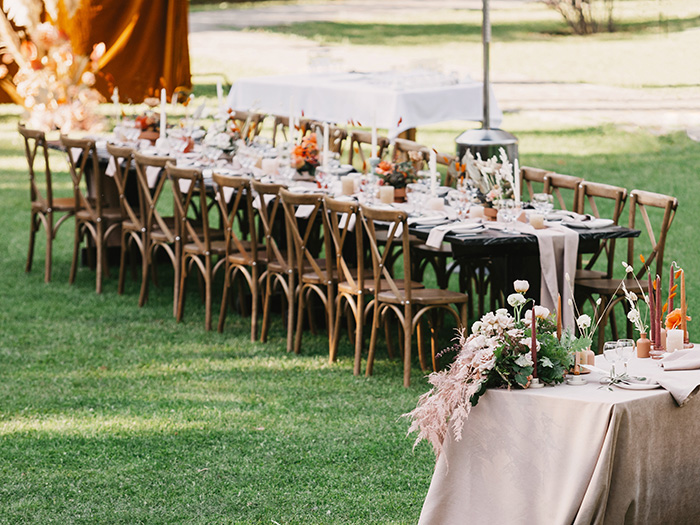 Wood cross back wedding chairs for rent.